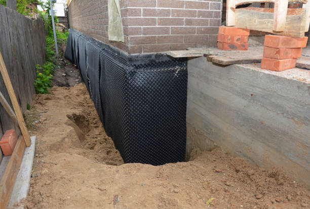 Happy homeowners after waterproofing job in Hillsboro